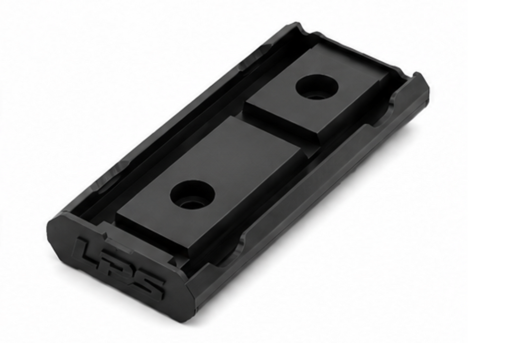 LatchWing low-profile M-LOK weapon light switch mounting bracket showing retention channel and mounting points