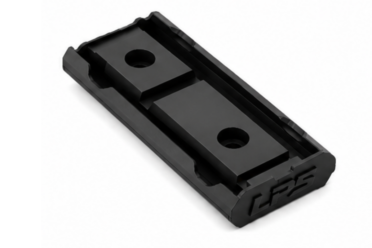 LatchWing low-profile M-LOK weapon light switch mounting bracket showing retention channel and mounting points