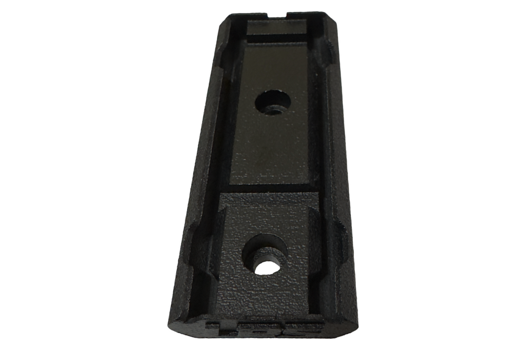 LatchWing low-profile M-LOK weapon light switch mounting bracket showing retention channel and mounting points